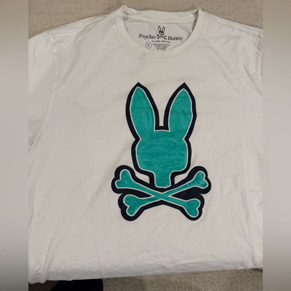 Psycho Bunny White t w/ Teal & Black Bunny Graphic Small stain circled in blue